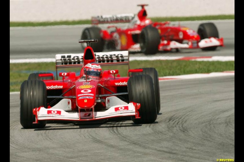 The Ferraris during Saturday practice for the Malaysian GP. Sepang, March 22nd 2003.