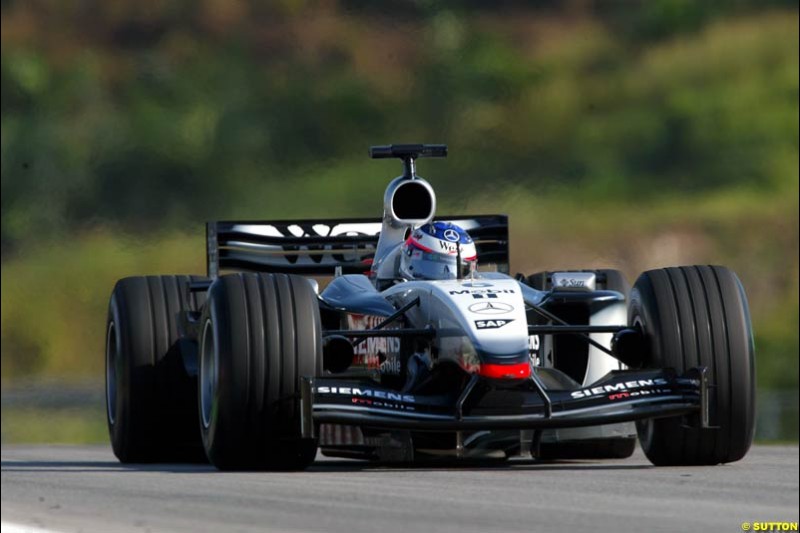 Kimi Raikkonen, McLaren, during Saturday practice for the Malaysian GP. Sepang, March 22nd 2003.