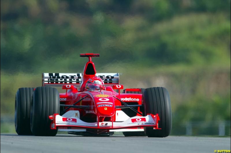 Michael Schumacher, Ferrari, during Saturday practice for the Malaysian GP. Sepang, March 22nd 2003.