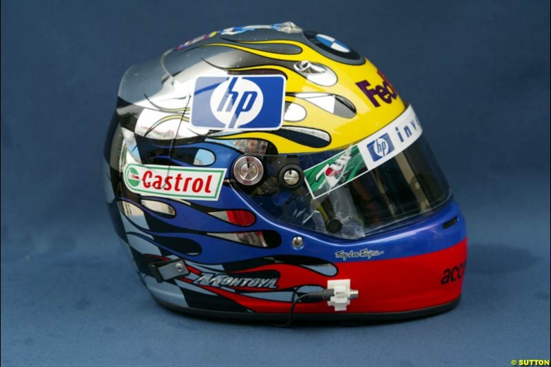 Juan Pablo Montoya presents a specially-designed helmet at the Brazilian Grand Prix. Interlagos, Sao Paulo, April 4th 2003.