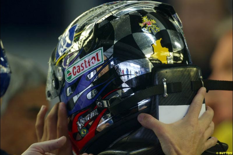 Juan Pablo Montoya presents a specially-designed helmet at the Brazilian Grand Prix. Interlagos, Sao Paulo, April 4th 2003.