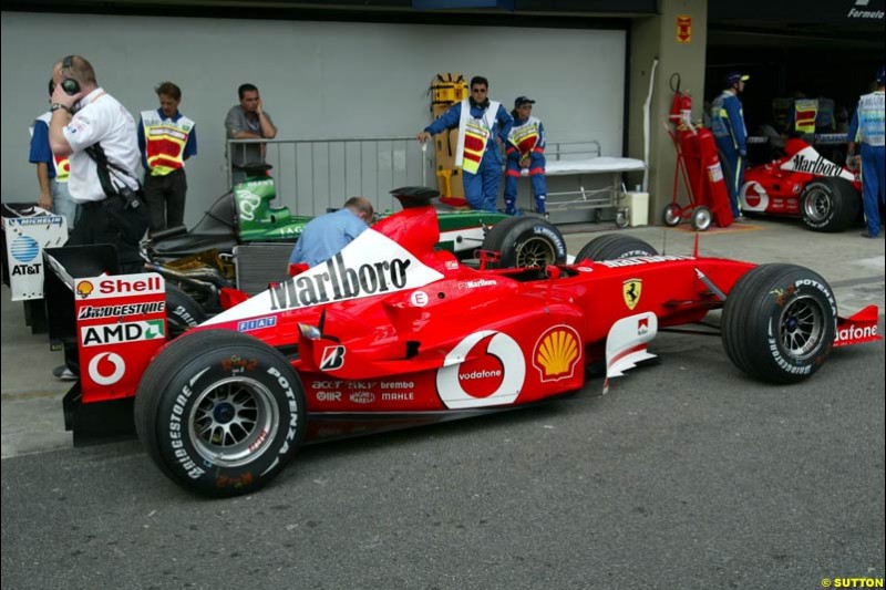 Parc ferme after Saturday qualifying for the Brazilian Grand Prix. Interlagos, Sao Paulo, April 5th 2003.