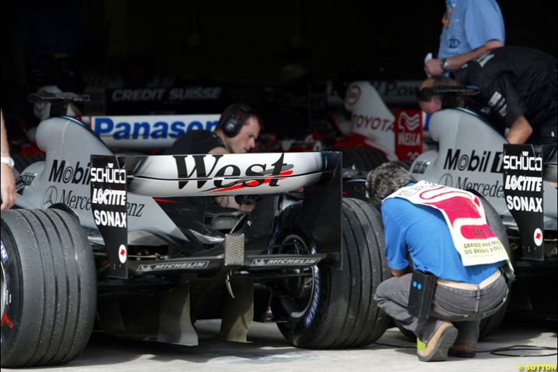 Parc ferme after Saturday qualifying for the Brazilian Grand Prix. Interlagos, Sao Paulo, April 5th 2003.