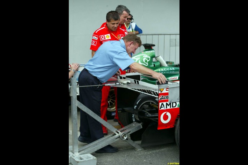 Parc ferme after Saturday qualifying for the Brazilian Grand Prix. Interlagos, Sao Paulo, April 5th 2003.