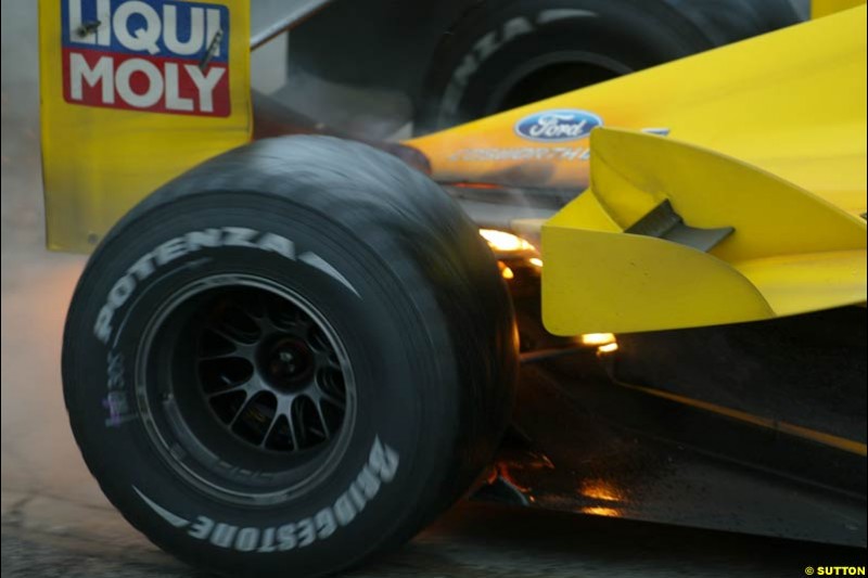 Giancarlo Fisichella, Jordan, suffers a small fire. Brazilian Grand Prix. Interlagos, Sao Paulo, April 6th 2003.