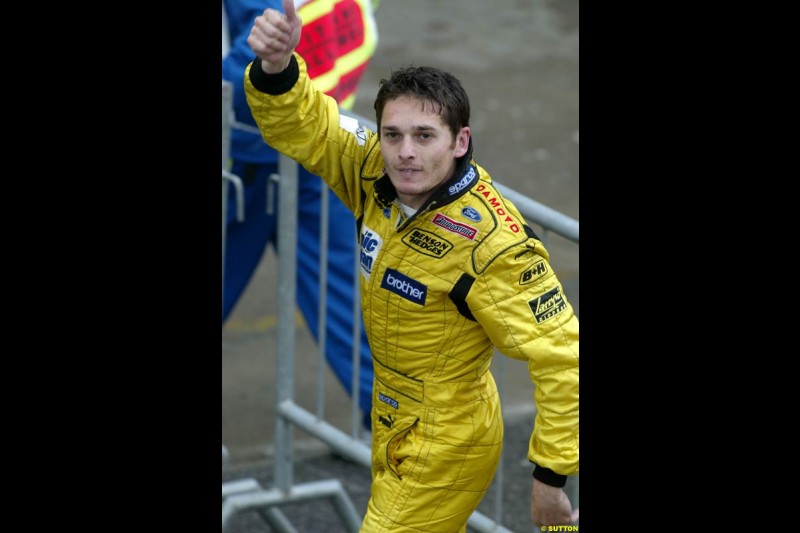 Giancarlo Fisichella, Jordan, celebrates an unconfirmed victory, later corrected to second place. Brazilian Grand Prix. Interlagos, Sao Paulo, April 6th 2003.