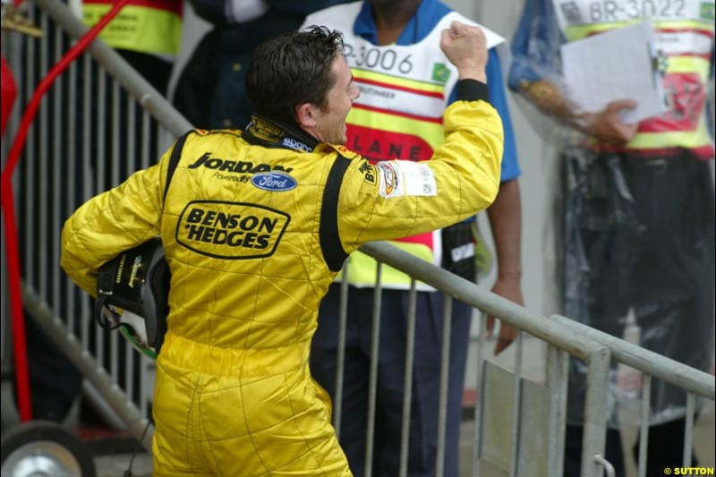 Giancarlo Fisichella, Jordan, celebrates an unconfirmed victory, later corrected to second place. Brazilian Grand Prix. Interlagos, Sao Paulo, April 6th 2003.