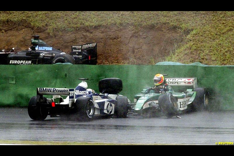 Antonio Pizzonia, Jaguar, comes to a halt next to Juan Pablo Montoya, Williams. Brazilian Grand Prix. Interlagos, Sao Paulo, April 6th 2003.