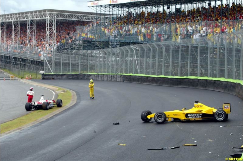 Ralph Firman, Jordan, and Olivier Panis, Totoya, after their accident took both drivers out. Brazilian Grand Prix. Interlagos, Sao Paulo, April 6th 2003.