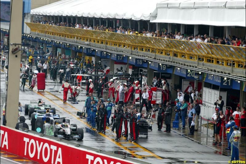 Wet weather conditions effect not just the track. Brazilian Grand Prix. Interlagos, Sao Paulo, April 6th 2003.