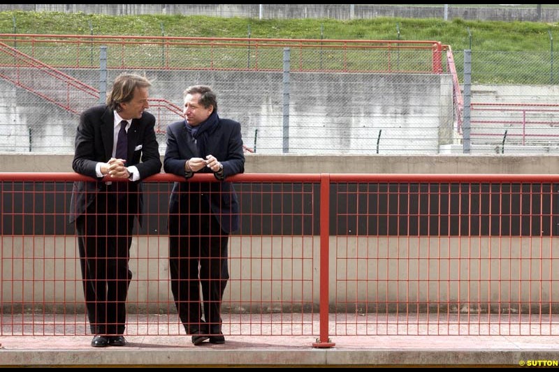 Ferrari president Luca di Montezemolo talks to Jean Todt during testing at Mugello, Italy. 9 April, 2003.