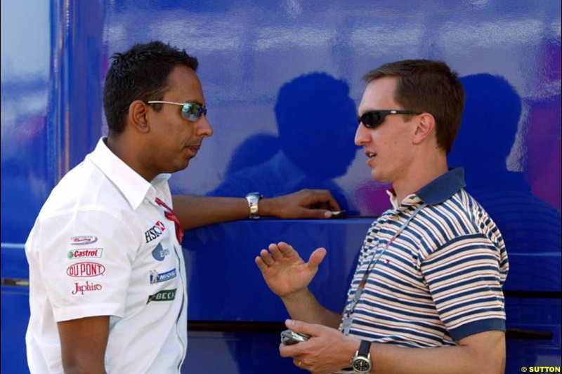 Jaguar's communications director Nav Sidhu with Luciano Burti. Friday at the Circuit de Catalunya, Barcelona, Spain. May 2nd 2003