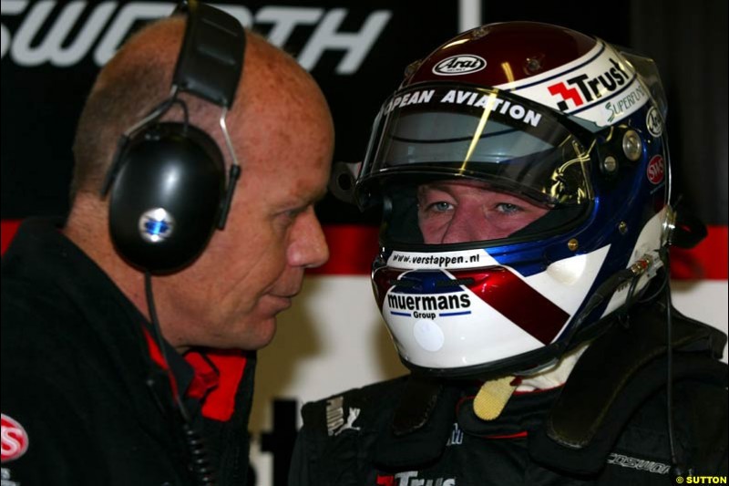 Minardi engineer Greg Wheeler and Jos Verstappen. Friday morning testing, Circuit de Catalunya. Barcelona, Spain. May 2nd 2003.