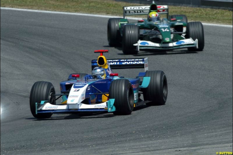 Nick Heidfeld, Sauber, ahead of Mark Webber, Jaguar. Spanish Grand Prix. Circuit de Catalunya, Barcelona, Spain. May 4th 2003.
