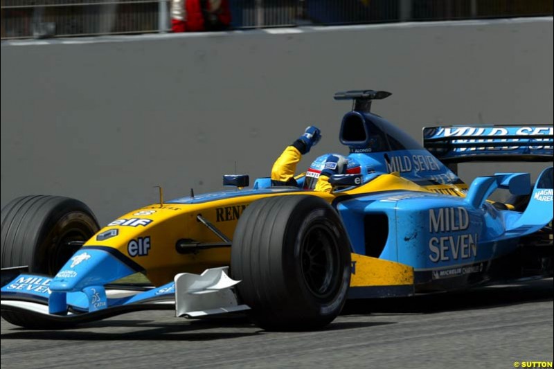 Fernando Alonso, Renault, crosses the line. Spanish Grand Prix. Circuit de Catalunya, Barcelona, Spain. May 4th 2003.