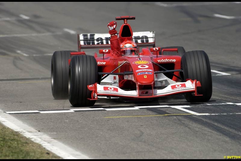 Michael Schumacher, Ferrari, crosses the line. Spanish Grand Prix. Circuit de Catalunya, Barcelona, Spain. May 4th 2003.