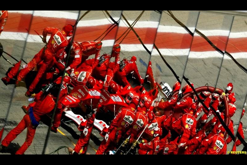 A Ferrari pit stop. Spanish Grand Prix. Circuit de Catalunya, Barcelona, Spain. May 4th 2003.