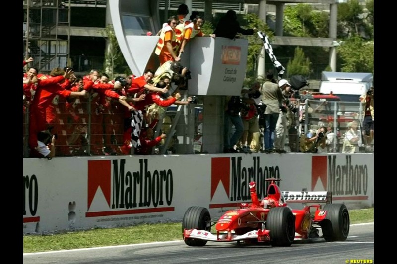 Michael Schumacher, Ferrari, celebrates victory. Spanish Grand Prix. Circuit de Catalunya, Barcelona, Spain. May 4th 2003.