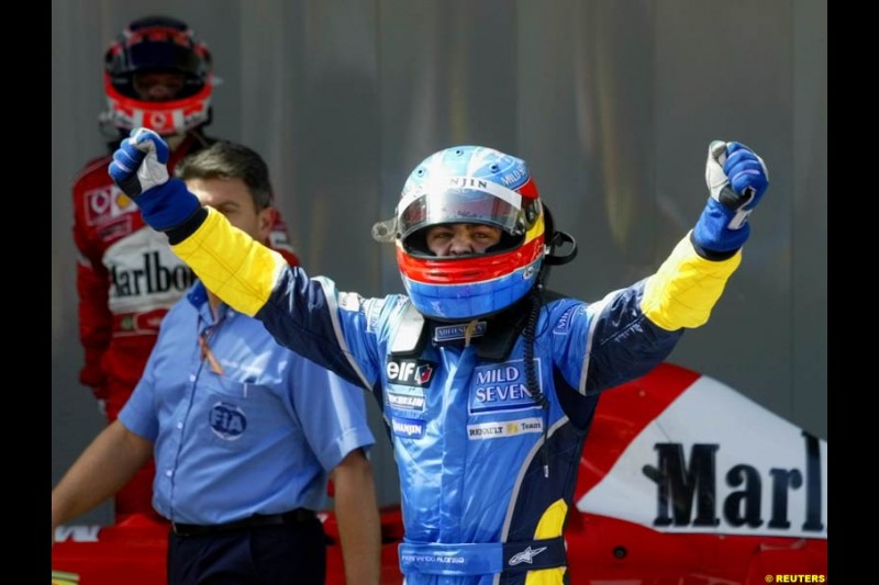 Fernando Alonso, Renault, celebrates second place. Spanish Grand Prix. Circuit de Catalunya, Barcelona, Spain. May 4th 2003.