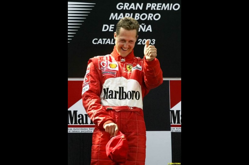 Michael Schumacher, Ferrari, celebrates victory. Spanish Grand Prix. Circuit de Catalunya, Barcelona, Spain. May 4th 2003.