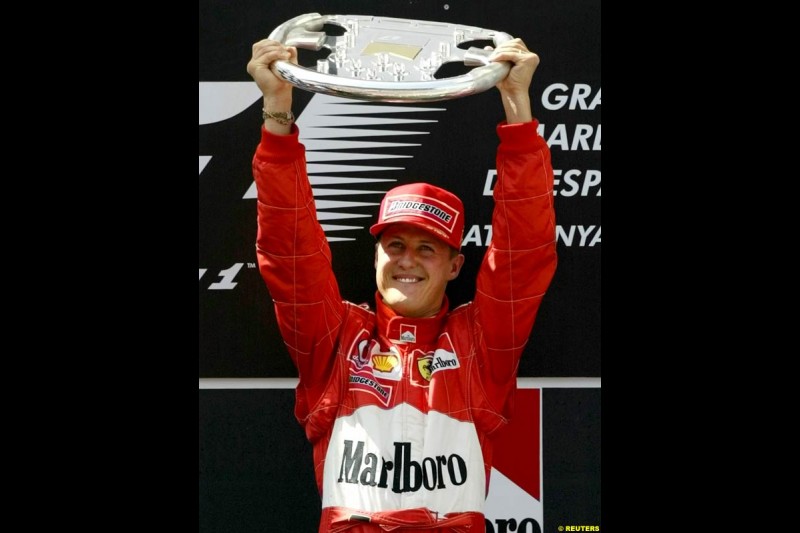 Michael Schumacher, Ferrari, celebrates victory. Spanish Grand Prix. Circuit de Catalunya, Barcelona, Spain. May 4th 2003.