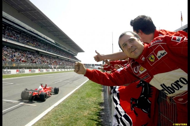 Ferrari celebrate victory. Spanish Grand Prix. Circuit de Catalunya, Barcelona, Spain. May 4th 2003.