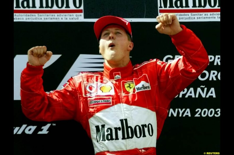 Michael Schumacher, Ferrari, celebrates victory. Spanish Grand Prix. Circuit de Catalunya, Barcelona, Spain. May 4th 2003.
