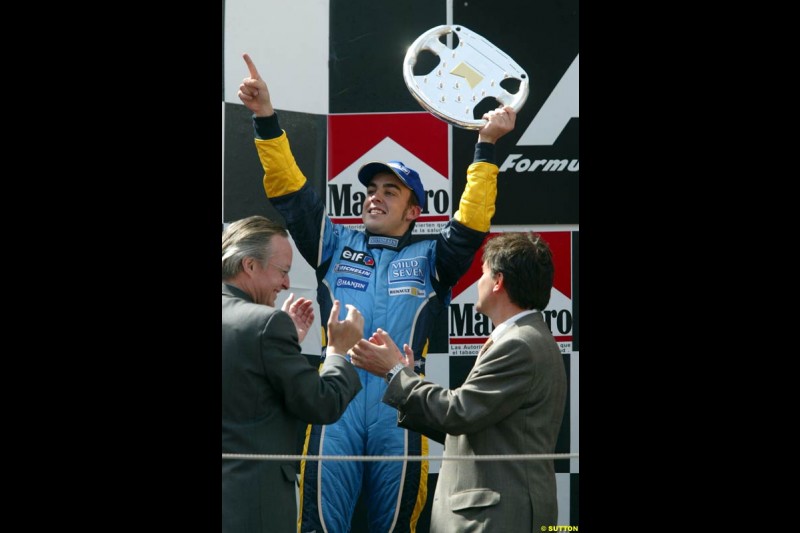 Fernando Alonso, Renault, celebrates second place. Spanish Grand Prix. Circuit de Catalunya, Barcelona, Spain. May 4th 2003.