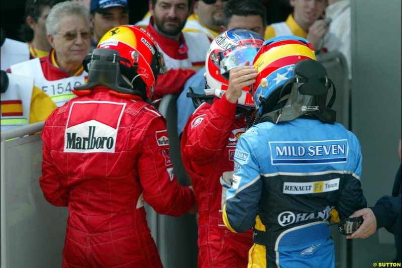 Michael Schumacher, Ferrari, Fernando Alonso, Renault, Rubens Barrichello, Ferrari. Spanish Grand Prix. Circuit de Catalunya, Barcelona, Spain. May 4th 2003.