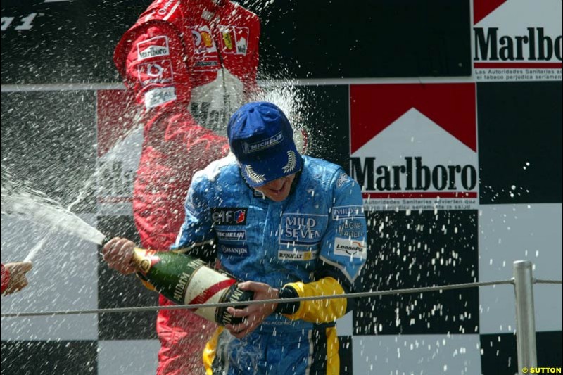 Fernando Alonso, Renault, celebrates second place. Spanish Grand Prix. Circuit de Catalunya, Barcelona, Spain. May 4th 2003.