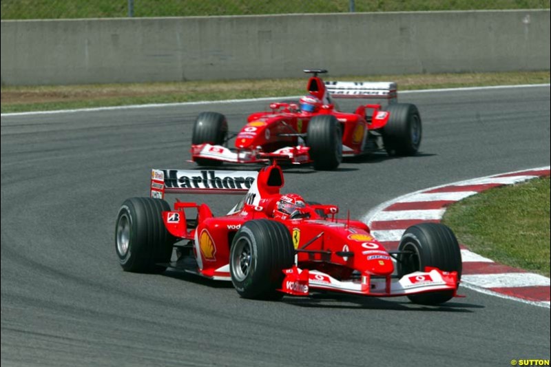 Michael Schumacher, Ferrari, leads Rubens Barrichello, Ferrari. Spanish Grand Prix. Circuit de Catalunya, Barcelona, Spain. May 4th 2003.