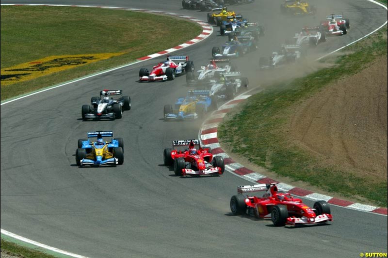 The first lap. Spanish Grand Prix. Circuit de Catalunya, Barcelona, Spain. May 4th 2003.