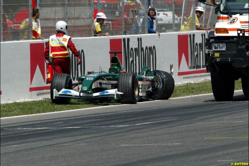 Antonio Pizzonia, Jaguar, was struck by Kimi Raikkonen, McLaren, at the race start. Spanish Grand Prix. Circuit de Catalunya, Barcelona, Spain. May 4th 2003.