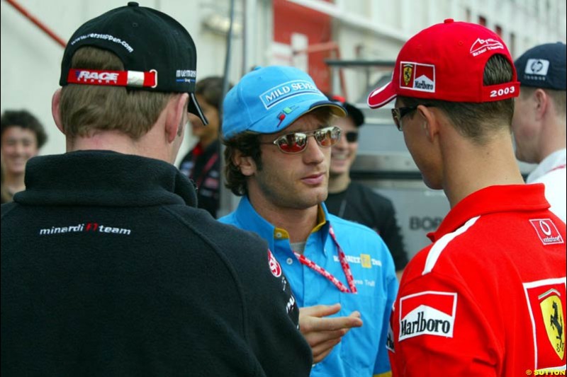 Jarno Trulli and Michael Schumacher. Sunday's Drivers' Parade at the Spanish Grand Prix. Circuit de Catalunya, Barcelona, Spain. May 4th 2003.