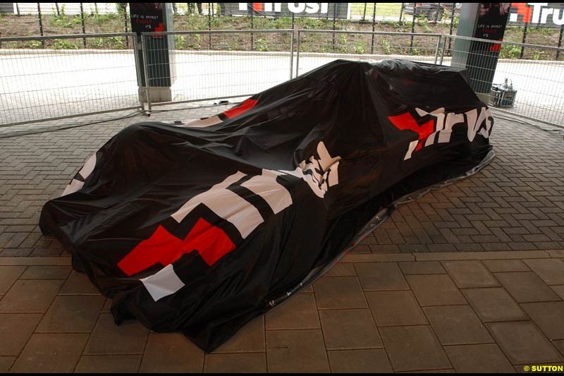 The Minardi team unveil their new livery, with Dutch company Trust as their new main sponsors. Dordrecht, the Netherlands. 22nd May, 2003.