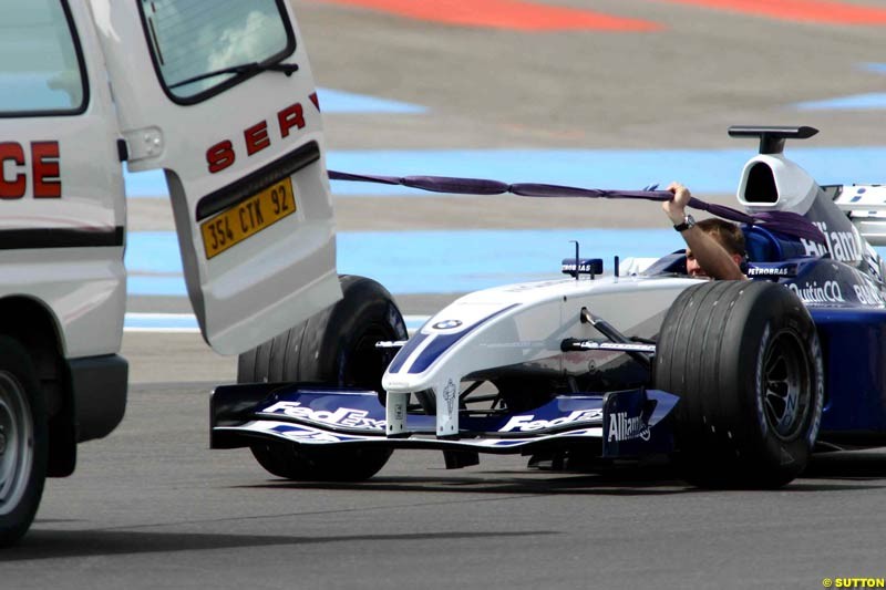 Marc Gene's Williams car towed back to the pits. Testing at Paul Ricard, France. May 7th 2003.