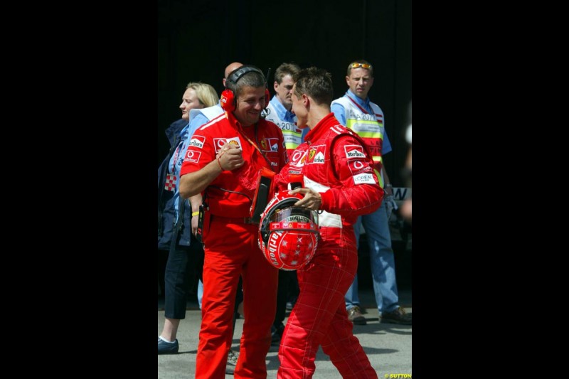 Michael Schumacher, Ferrari, celebrates pole position. Austrian Grand Prix. A1-Ring, Spielberg, Austria. May 17th 2003.