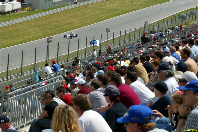 The crowd during qualifying for the Austrian Grand Prix. A1-Ring, Spielberg, Austria. May 17th 2003.