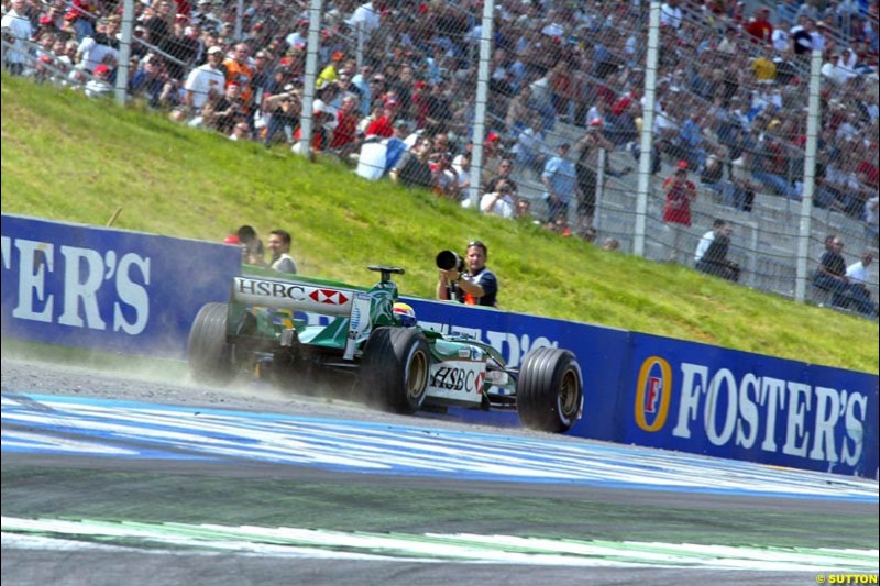 Mark Webber, Jaguar, takes to the dirt during qualifying for the Austrian Grand Prix. A1-Ring, Spielberg, Austria. May 17th 2003.