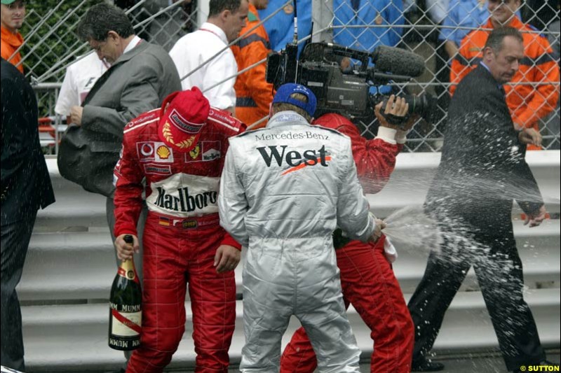 The Podium. Juan Pablo Montoya, Williams, 1st; Kimi Raikkonen, McLaren, 2nd; Michael Schumacher, Ferrari, 3rd. Monaco Grand Prix, Sunday, June 1st 2003.