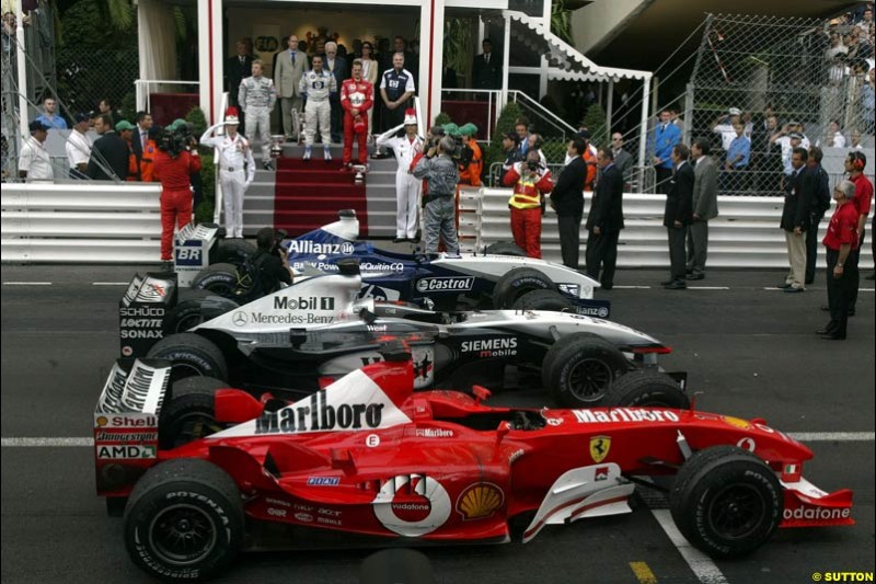 Juan Pablo Montoya, Williams, 1st; Kimi Raikkonen, McLaren, 2nd; Michael Schumacher, Ferrari, 3rd. Monaco Grand Prix, Sunday, June 1st 2003.