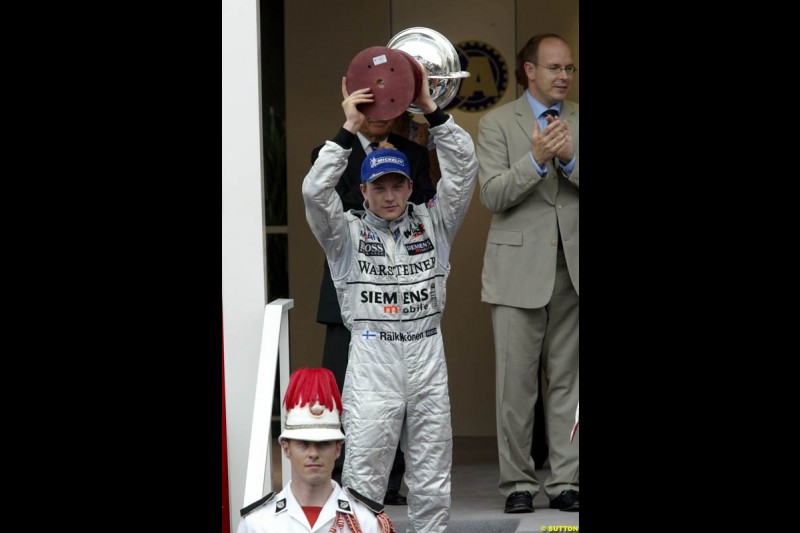 Kimi Raikkonen, McLaren, celebrates second place. Monaco Grand Prix, Sunday, June 1st 2003.