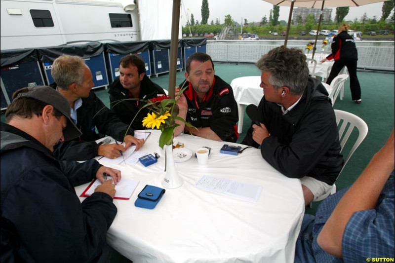 Paul Stoddard, Minardi Team Principal, chats to the press. Canadian Grand Prix, Montreal, Saturday, June 14th 2003.