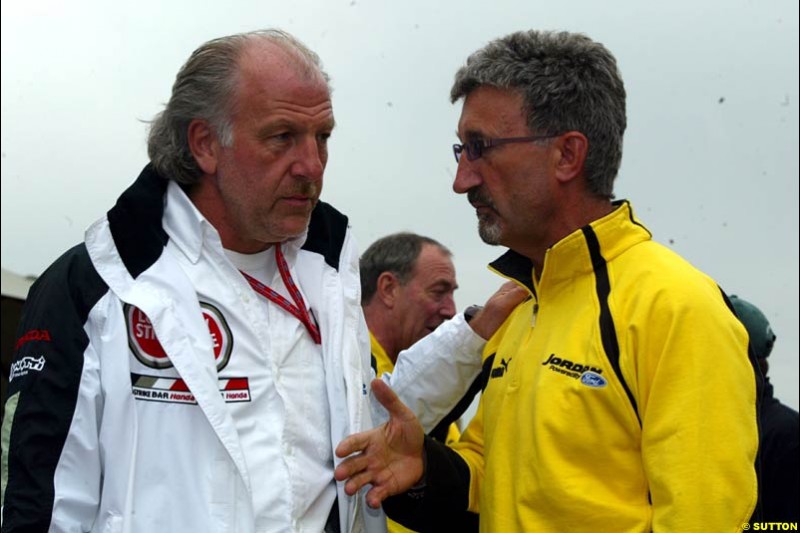 Eddie Jordan, Jordan Team Principal, chats to David Richards, BAR Team Principal. Canadian Grand Prix, Montreal, Saturday, June 14th 2003.