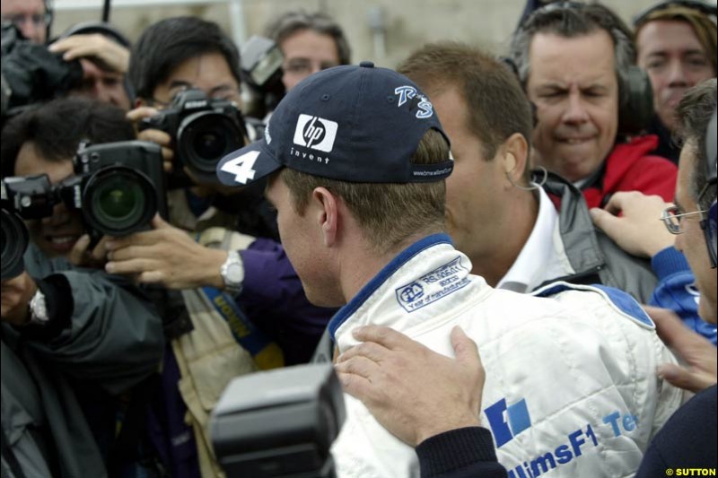 Ralf Schumacher, Williams, celebrates pole position. Canadian Grand Prix, Montreal, Saturday, June 14th 2003.