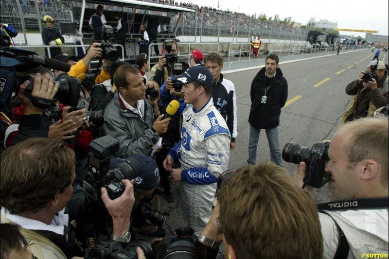 Ralf Schumacher, Williams, talks to the press after scoring pole position. Canadian Grand Prix, Montreal, Saturday, June 14th 2003.