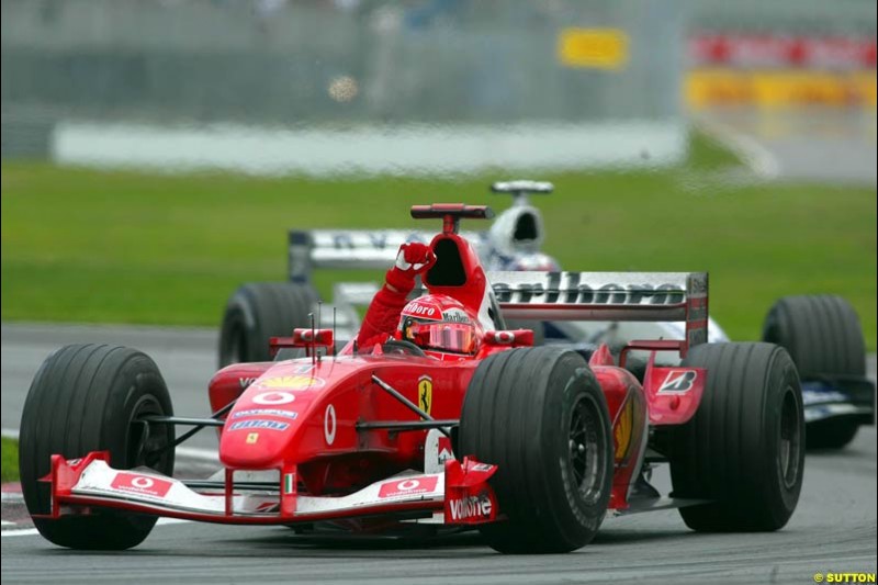 Michael Schumacher, Ferrari, celebrates victory. Canadian Grand Prix, Montreal, Sunday, June 15th 2003.