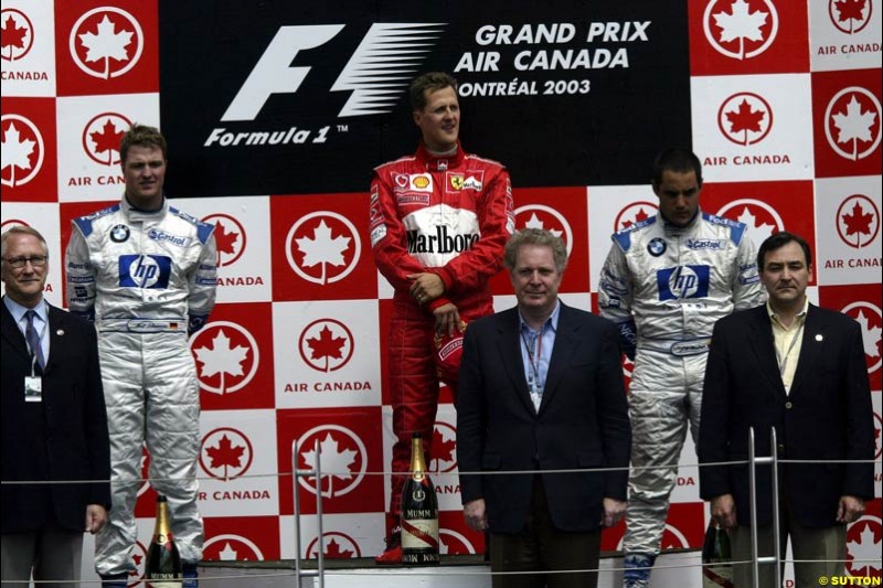 The Podium. 1st, Michael Schumacher, Ferrari; 2nd, Ralf Schumacher, Williams; 3rd, Juan Pablo Montoya, Williams. Canadian Grand Prix, Montreal, Sunday, June 15th 2003.