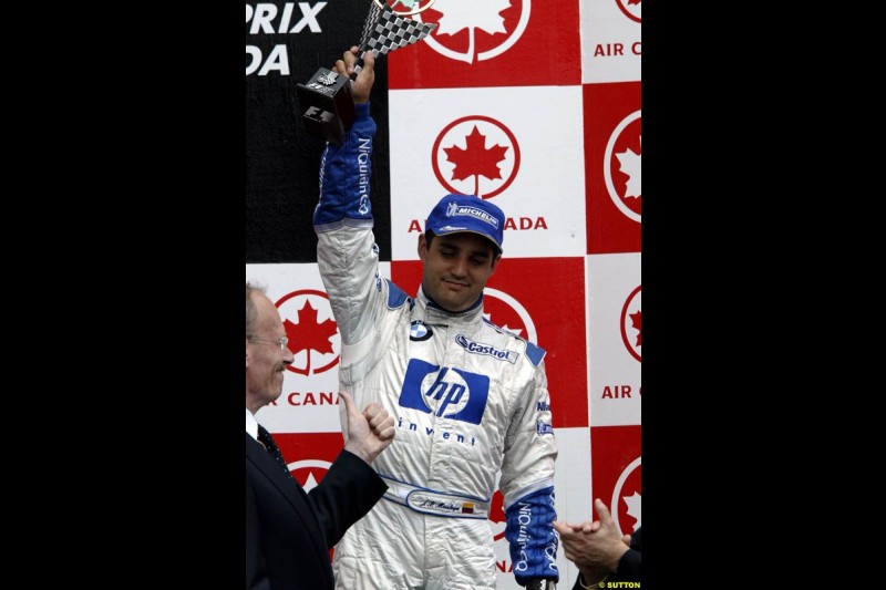 Juan Pablo Montoya, Williams, celebrates third place. Canadian Grand Prix, Montreal, Sunday, June 15th 2003.