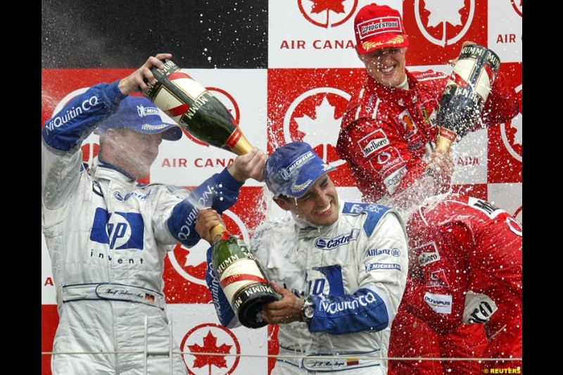 The Podium. 1st, Michael Schumacher, Ferrari; 2nd, Ralf Schumacher, Williams; 3rd, Juan Pablo Montoya, Williams. Canadian Grand Prix, Montreal, Sunday, June 15th 2003.
